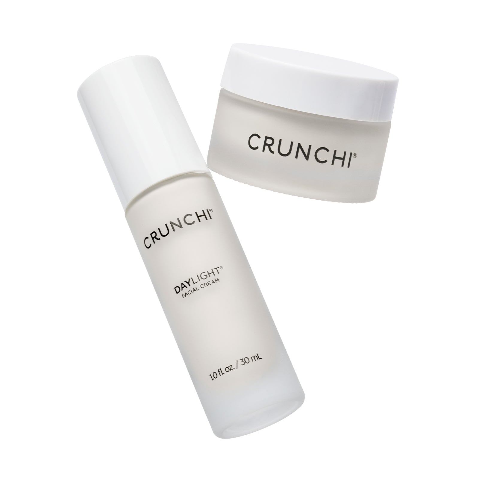 CRUNCHI skincare bottle and jar on a white background