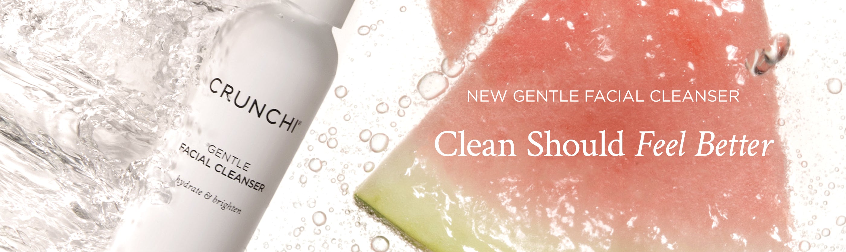 Crunchie Gentle Facial Cleanser with water droplets and pink background